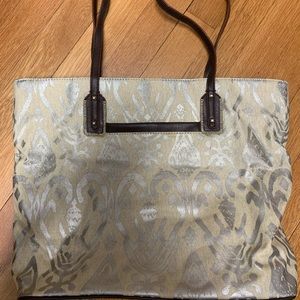 Medium size silver and tan tote. Like new!